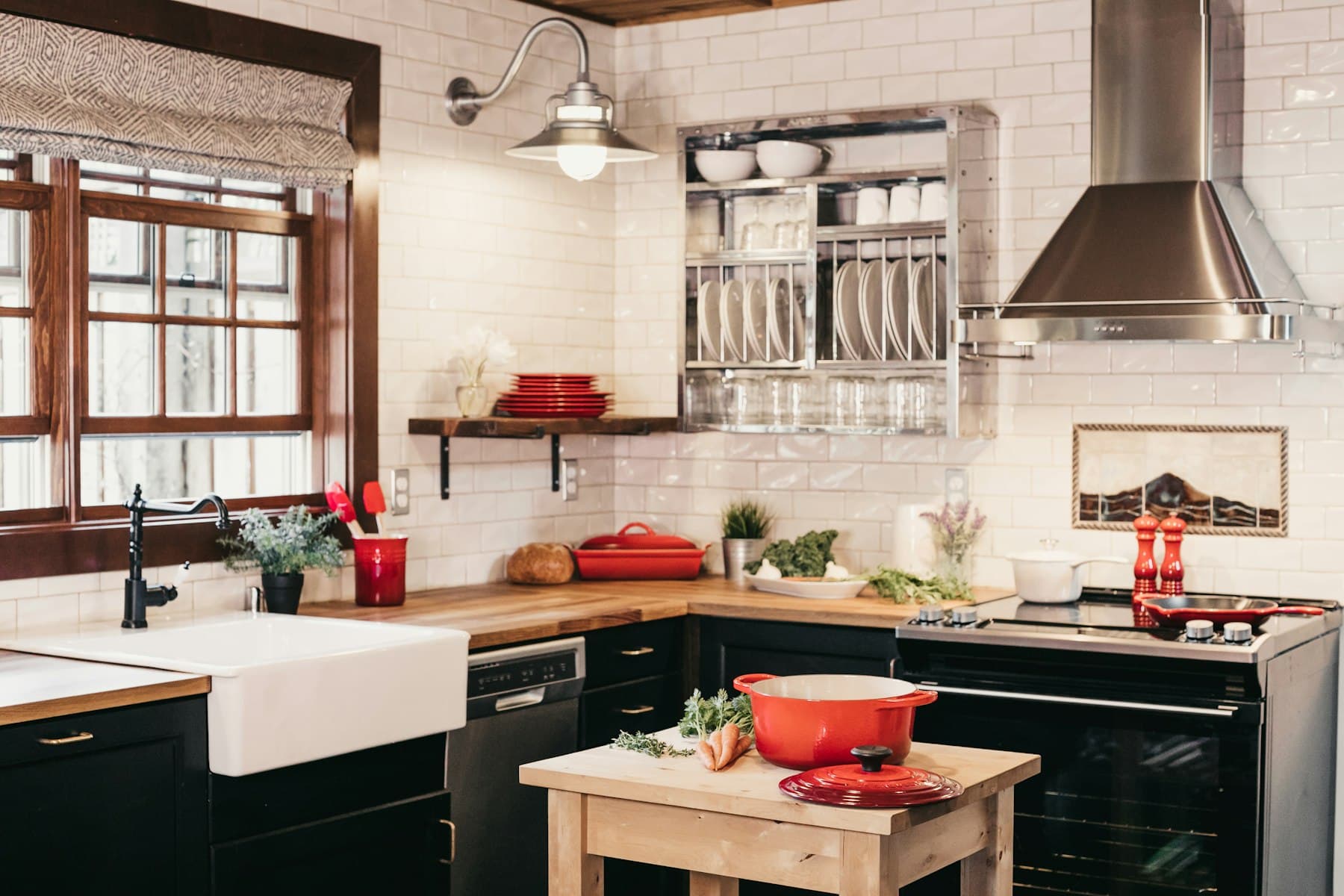 Black base cabinets and wood counters from the mill