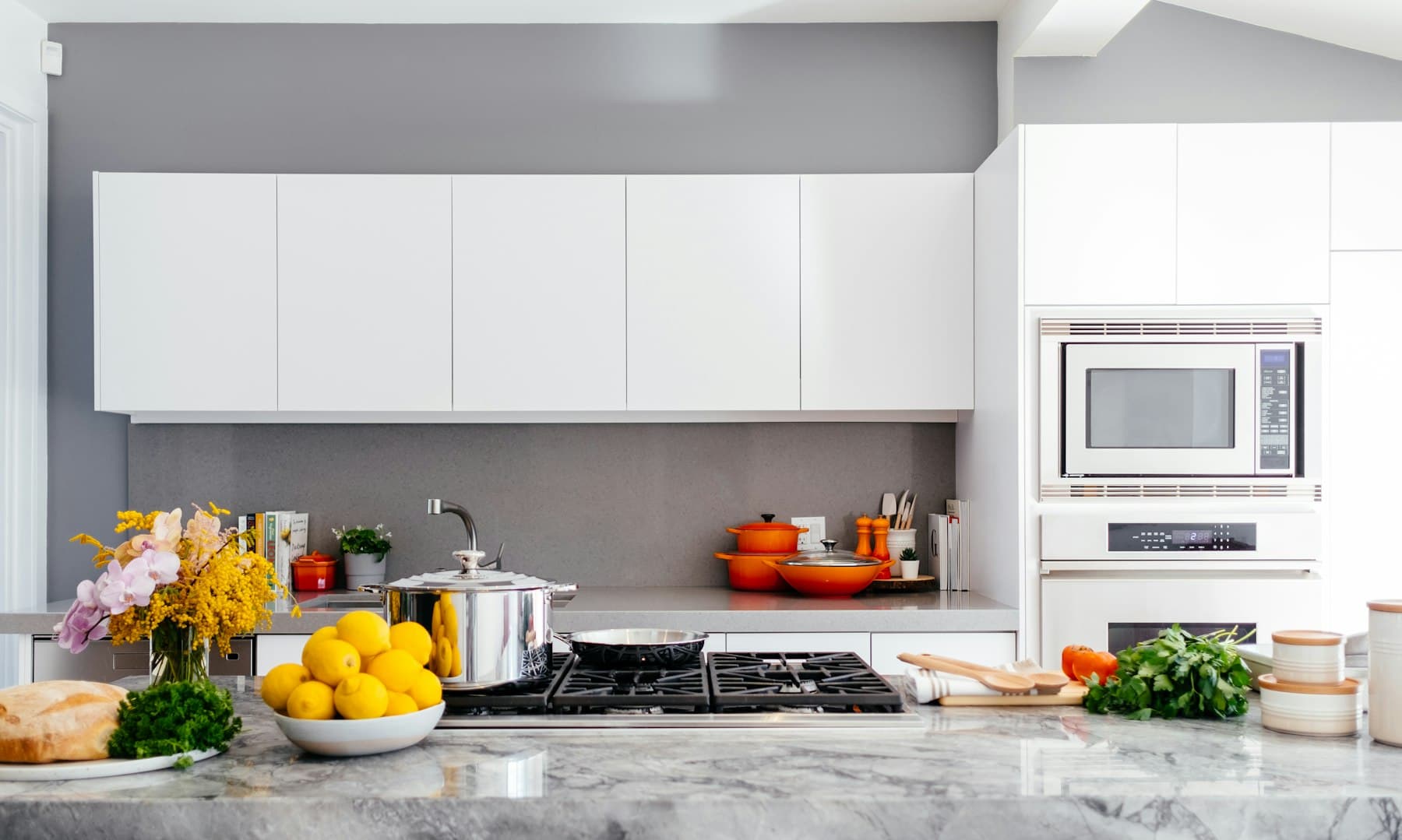 Marble island kitchen specified with mill cabinets